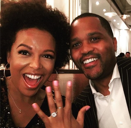 Kirby and her fiance Virgil showing their engagement rings